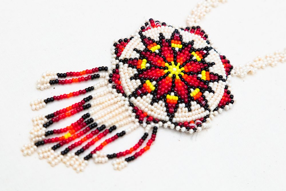 YELL 194574: pendant necklaceDecorative beaded necklace with large beaded pendant given to ethnology office by unknown…