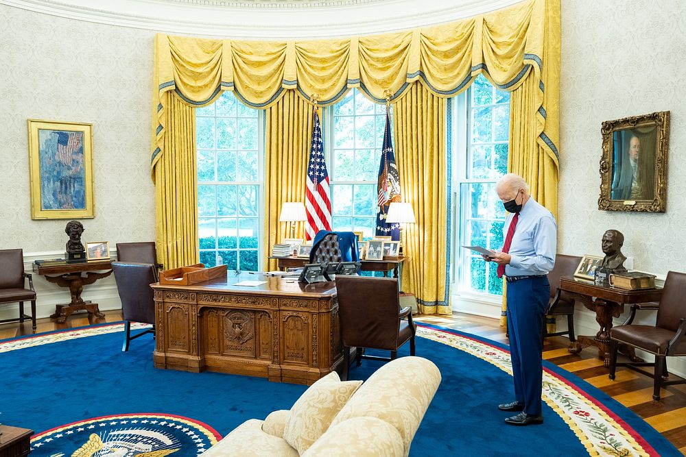 President Joe Biden works in the Oval Office, Friday, September 10, 2021. (Official White House Photo by Adam Schultz)