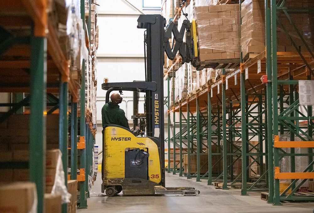 Capitol Area Food Bank CAFB forklift operator Michael OKoro Manages pallets of U.S. Department of Agriculture USDA Foods…