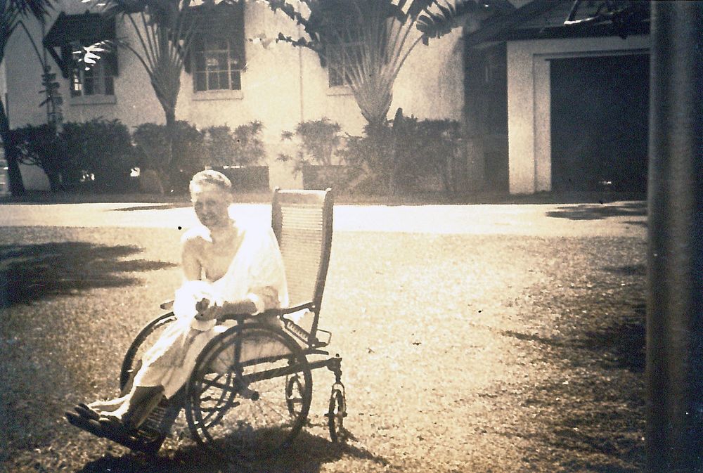 Naval Hospital Canacao, Philippine Islands, 1941. Pankoke [patient in wheelchair on lawn of hospital] 