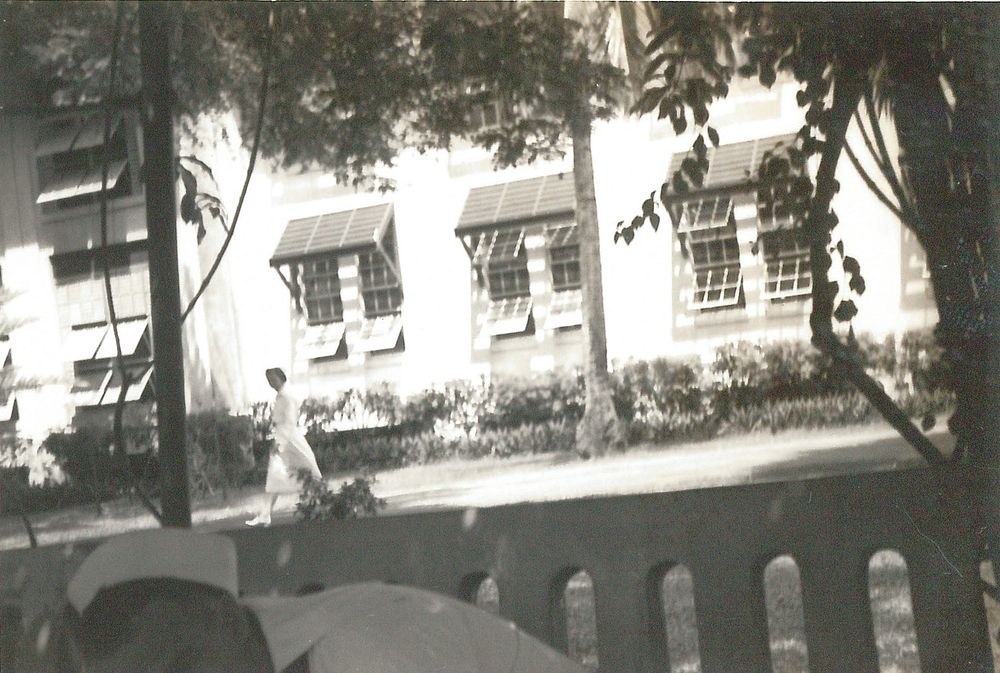 Naval Hospital Canacao, Philippine Islands, 1941. Miss Smith [Nurse walking down street].Naval Hospital Canacao, Philippine…