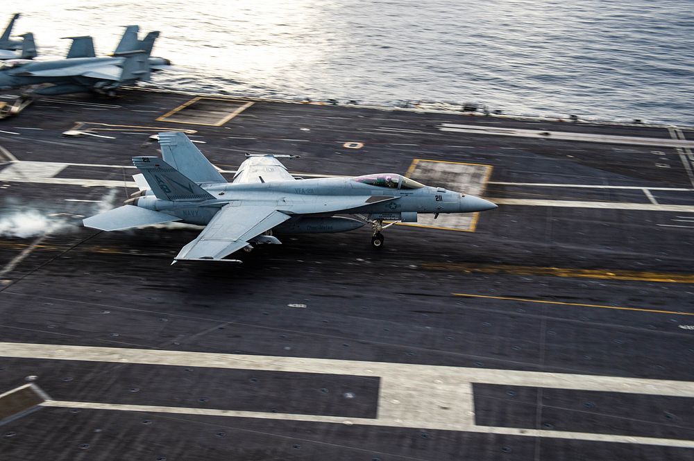 211213-N-YP095-1142 ATLANTIC OCEAN (Dec. 13, 2021) An F/A-18E Super Hornet, attached to the “Fighting Checkmates” of Strike…