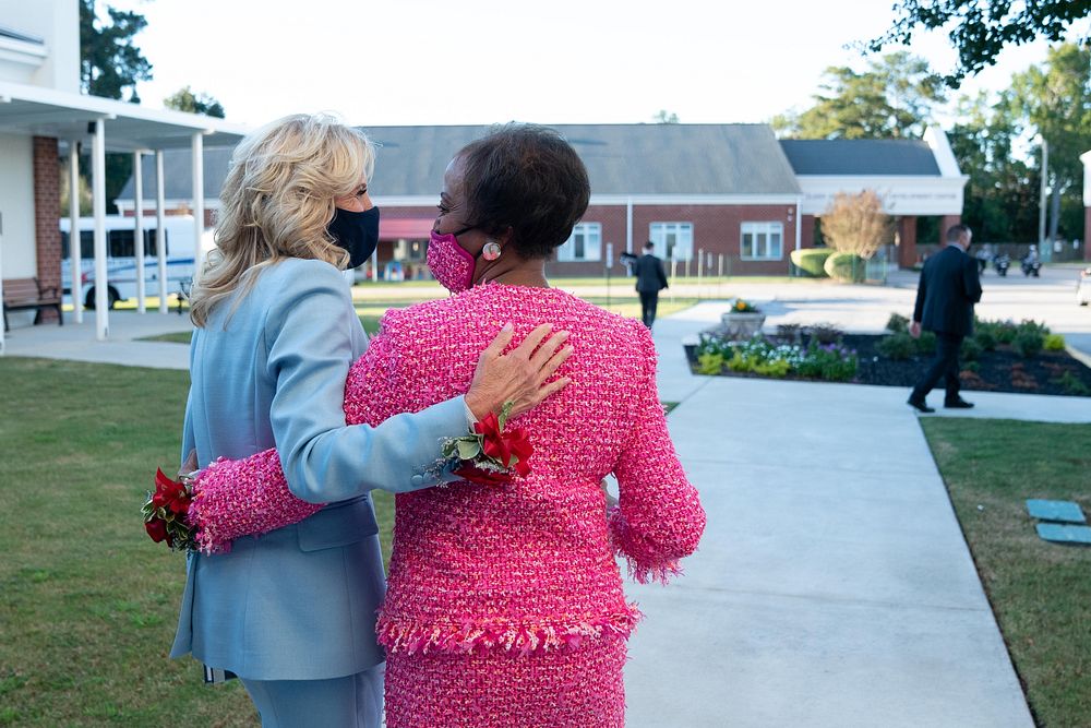 First Lady Jill Biden walks with her prayer partner Robin Jackson after attending the 50th Pastoral Anniversary of Pastor…