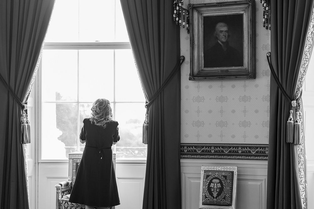 First Lady Jill Biden looks out the window of the Blue Room before a CBS This Morning roundtable, Monday, October 18, 2021…