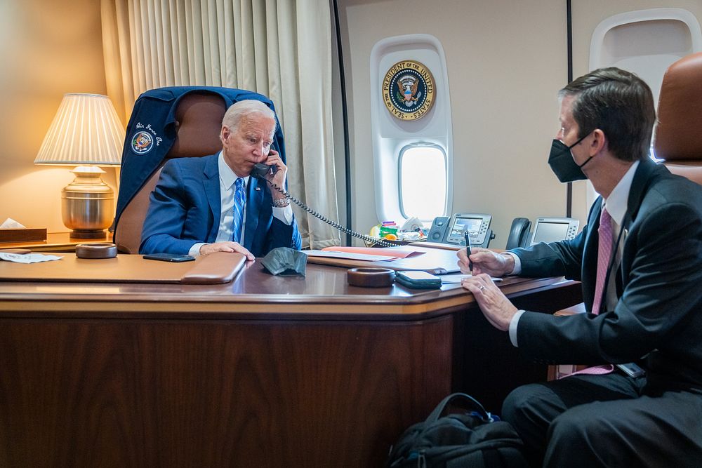 President Joe Biden speaks with Senator Mike Lee (R-Utah) aboard Air Force One en route to Joint Base Andrews, Maryland…