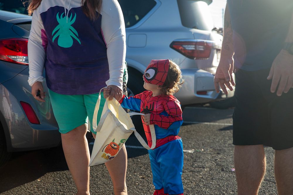 Kid in superhero costume. Original public domain image from Flickr