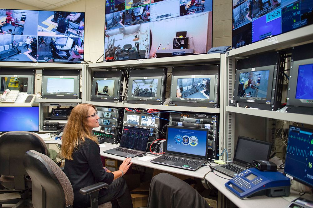 Michelle Warren, research physiologist and manager for Environmental Physiology and Human Performance lab, monitors testing…