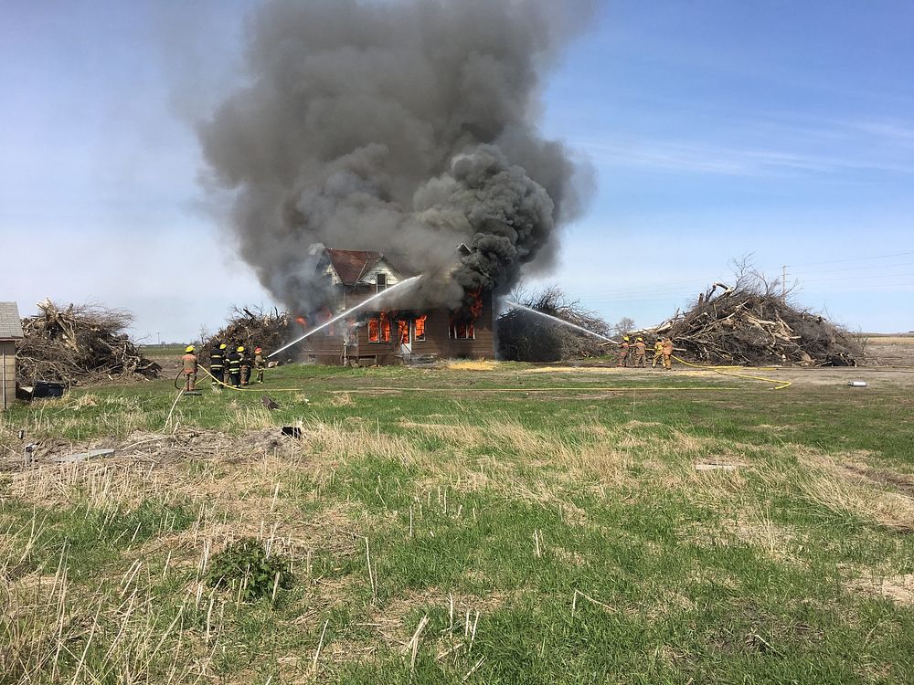2021 USFWS Fire Employee Photo Contest Category: InteragencyLocal fire crews practice their structure skills at Morris…