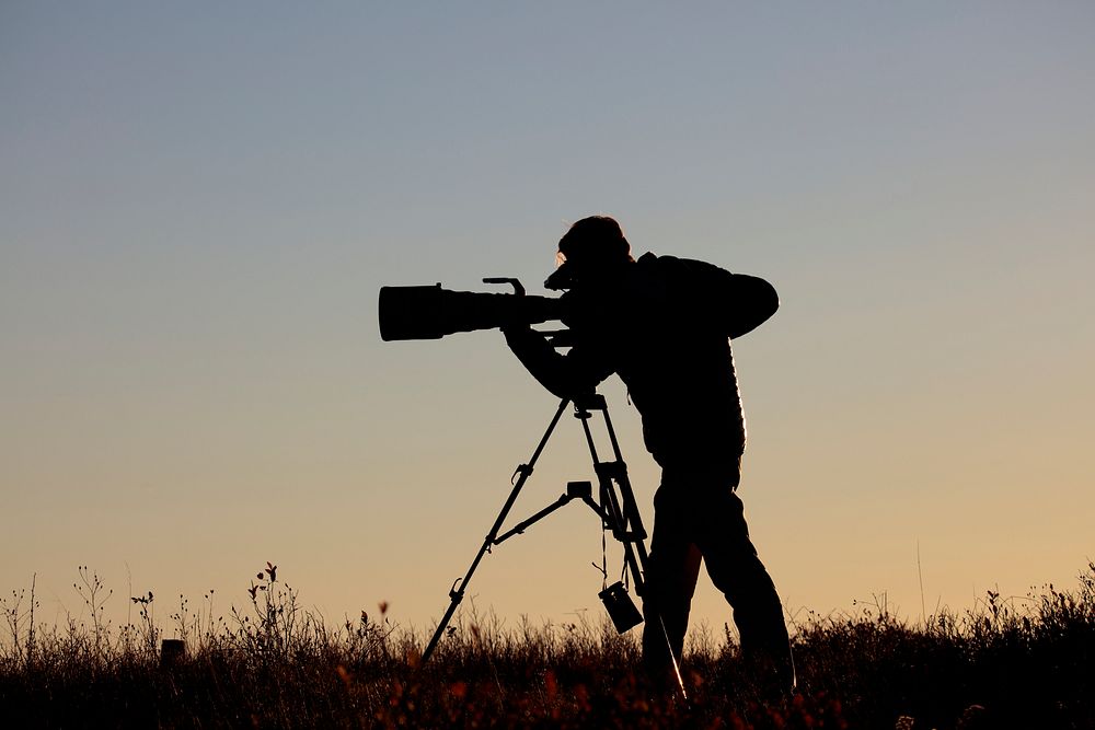 Videographer's Sunset Silhouette. Original public domain image from Flickr
