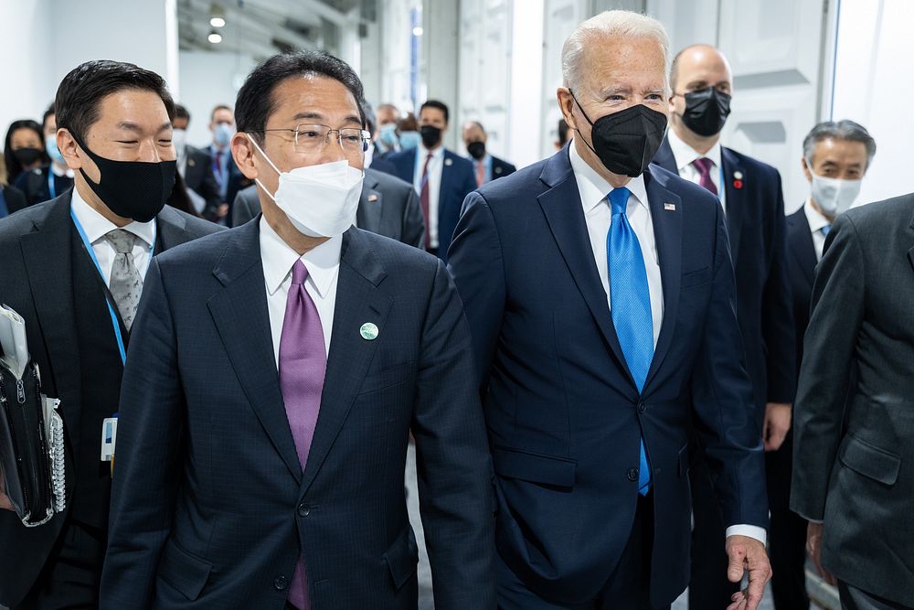 President Joe Biden walks with Japanese Prime Minister Fumio Kishida, Tuesday, November 2, 2021, during the COP26 U.N.…