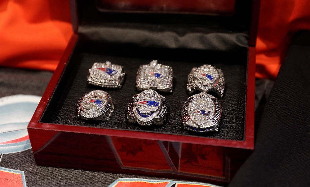 Counterfeit NFL Championship rings are displayed as U.S. Customs and Border Protection participates in a press conference to…