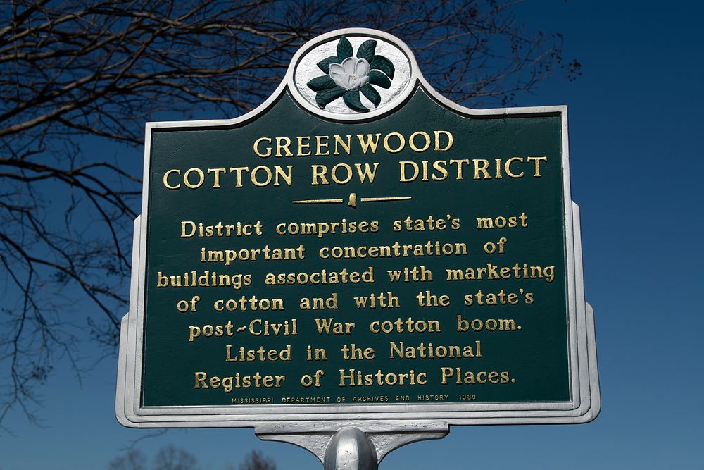 The Greenwood Cotton Row District sign.