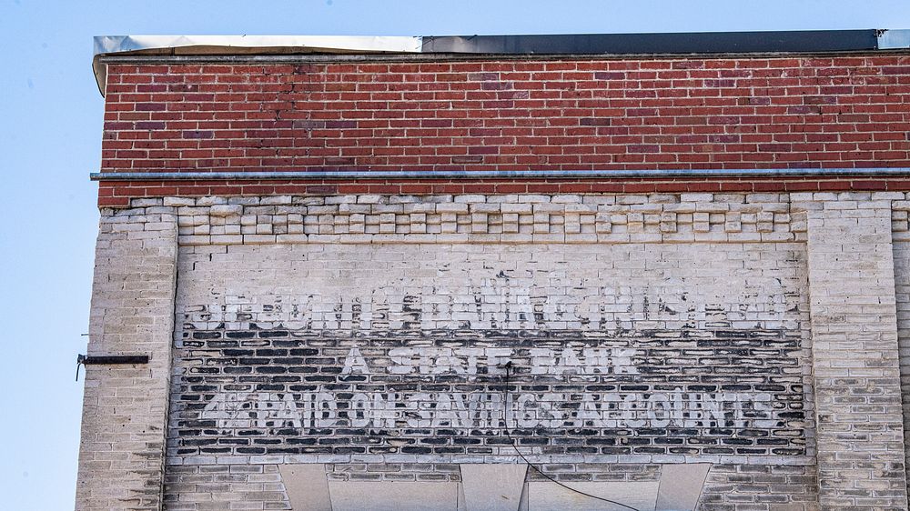 Faded wall signage in Central Historic District and Railroad Historic District of Greenwood, MS, on January 29, 2022. USDA…