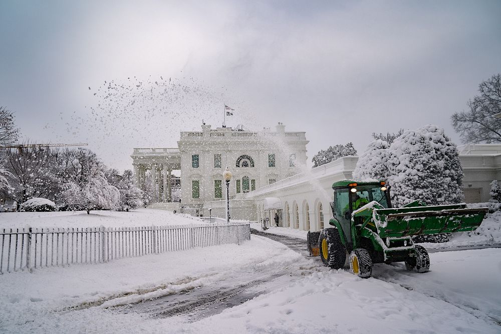 Snow is plowed Monday, January 3, 2022, in front of the West Wing Lobby Entrance of the White House. (Official White House…