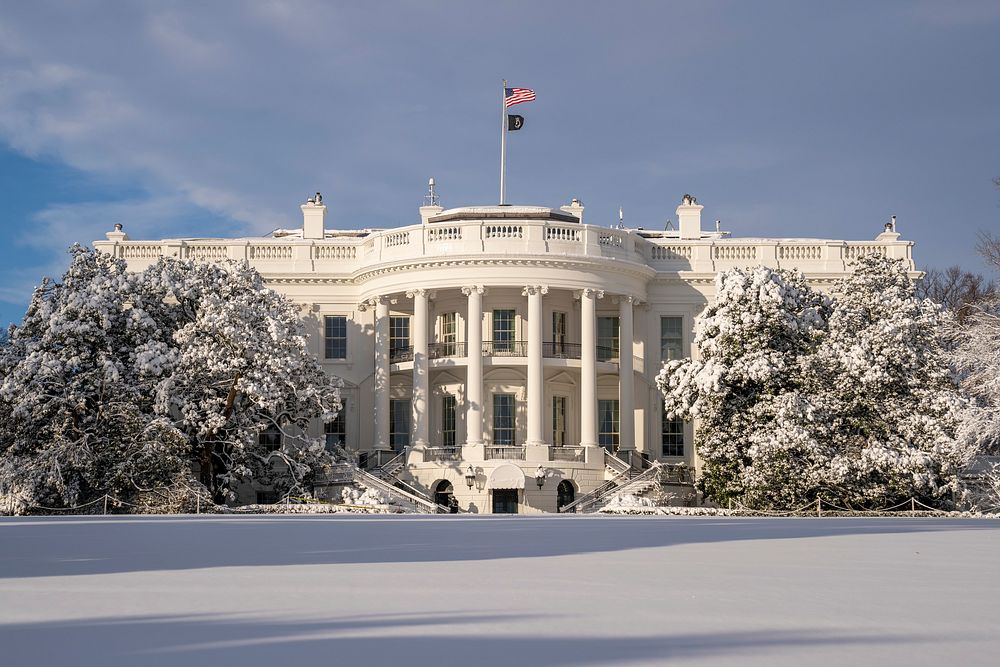 Snow blankets the South Lawn of the White House. 