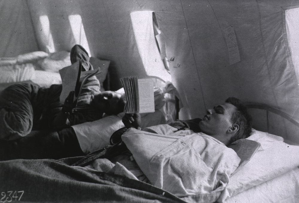 U.S. American National Red Cross Hospital No. 5, Auteuil, France: Wounded soldiers resting and reading in one of the…