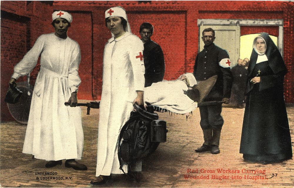 Red Cross workers carrying wounded bugler into hospitalCollection: Images from the History of Medicine (IHM) Contributor(s):…