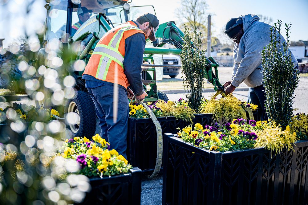 City of Greenville Public Works installs planters across the Uptown area on Monday, March 21. Original public domain image…