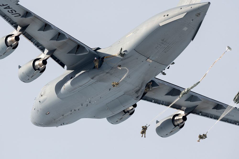 Air Force and Army conduct airborne operations at JBERArmy paratroopers from the 4th Infantry Brigade Combat Team…