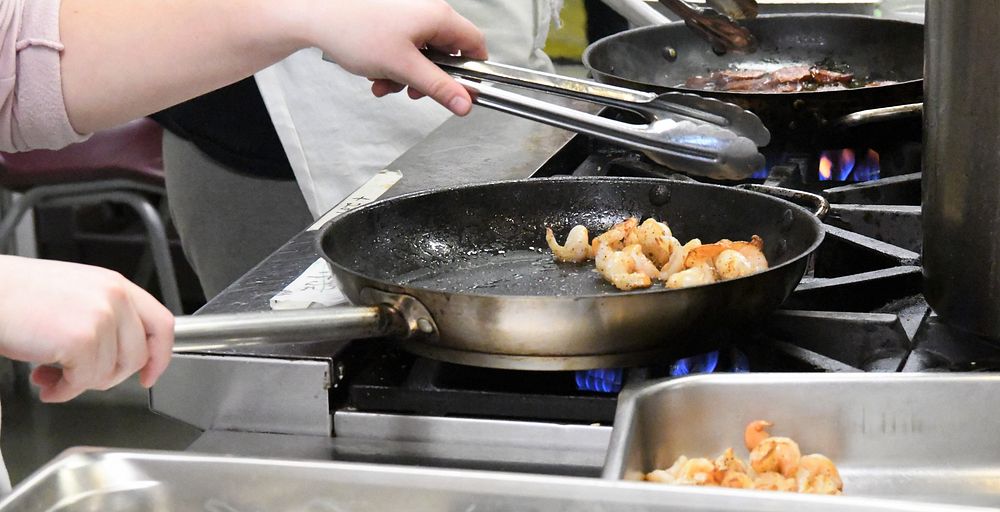 Members of the Fort Drum Culinary Arts Team shared their skills and experience with competition-style cooking with culinary…