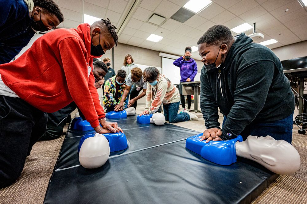 Students learning CPR at Greenville's Fire/Rescue training center at Station 6, date unknown. Original public domain image…