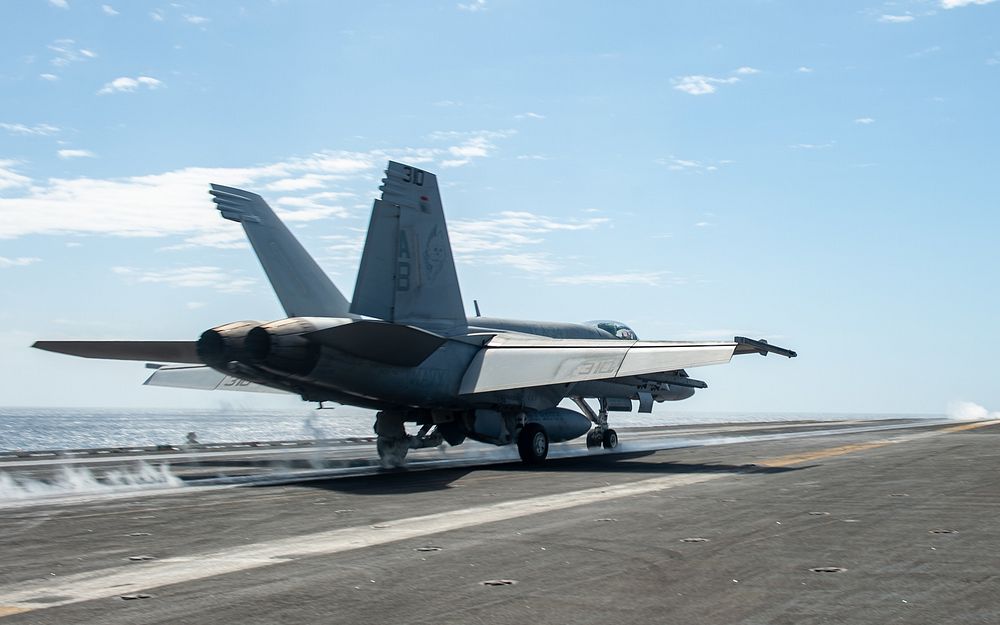 220401-N-PG226-1105 IONIAN SEA (April 1, 2022) An F/A-18E Super Hornet, attached to the “Blue Blasters” of Strike Fighter…