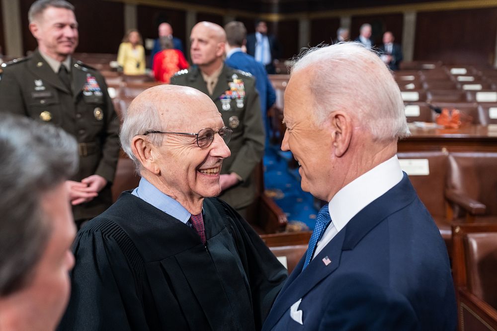 President Joe Biden greets retiring U.S. Supreme Court Justice Stephen Breyer after delivering his State of the Union…