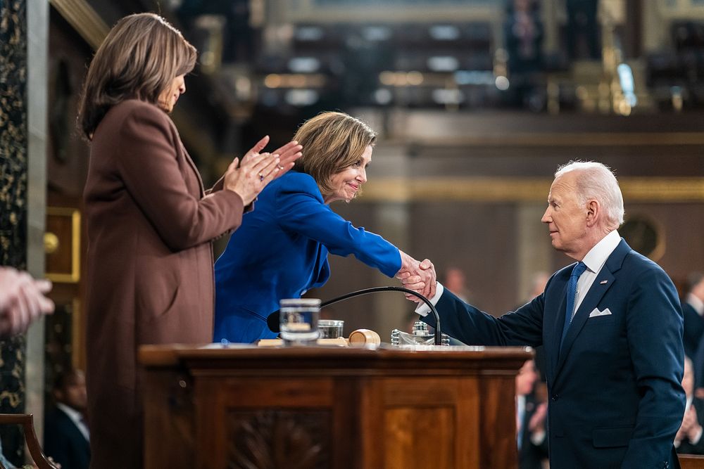 President Joe Biden shakes hands with House Speaker Nancy Pelosi after delivering his State of the Union address to a joint…