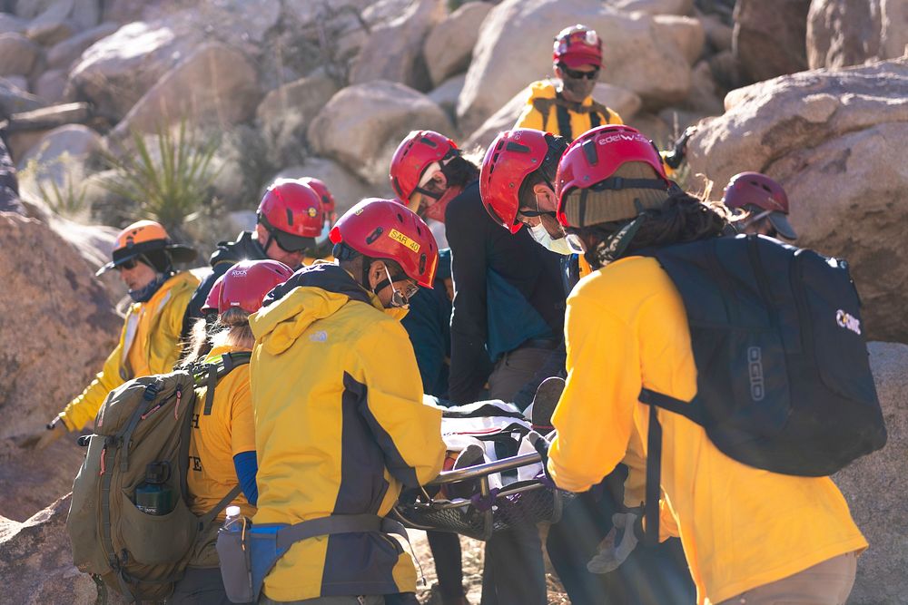Joshua Tree Search and Rescue team members training carrying a litter