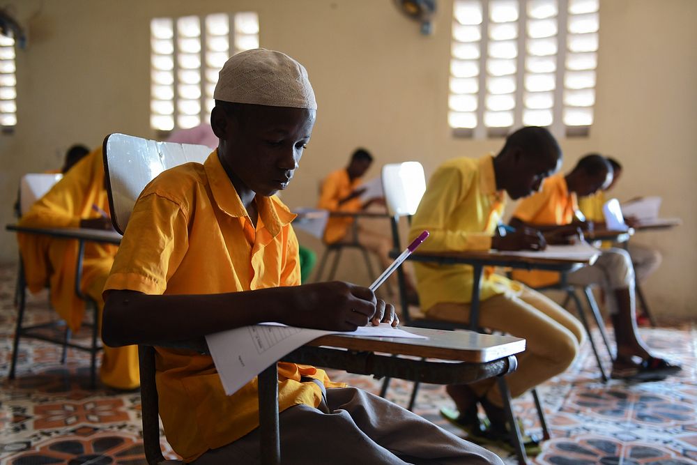 Boy student takes a national Primary Education Certificate exam in Mogadishu, Somalia, May 26, 2021. AMISOM Photo / Mokhtar…