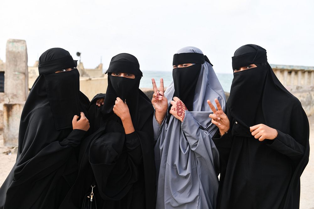 Somali women pose for a photo after Eid al-Adha prayers. AMISOM Photo/Fardosa Hussein. Hamar weyne, Mogadishu, Somalia, July…