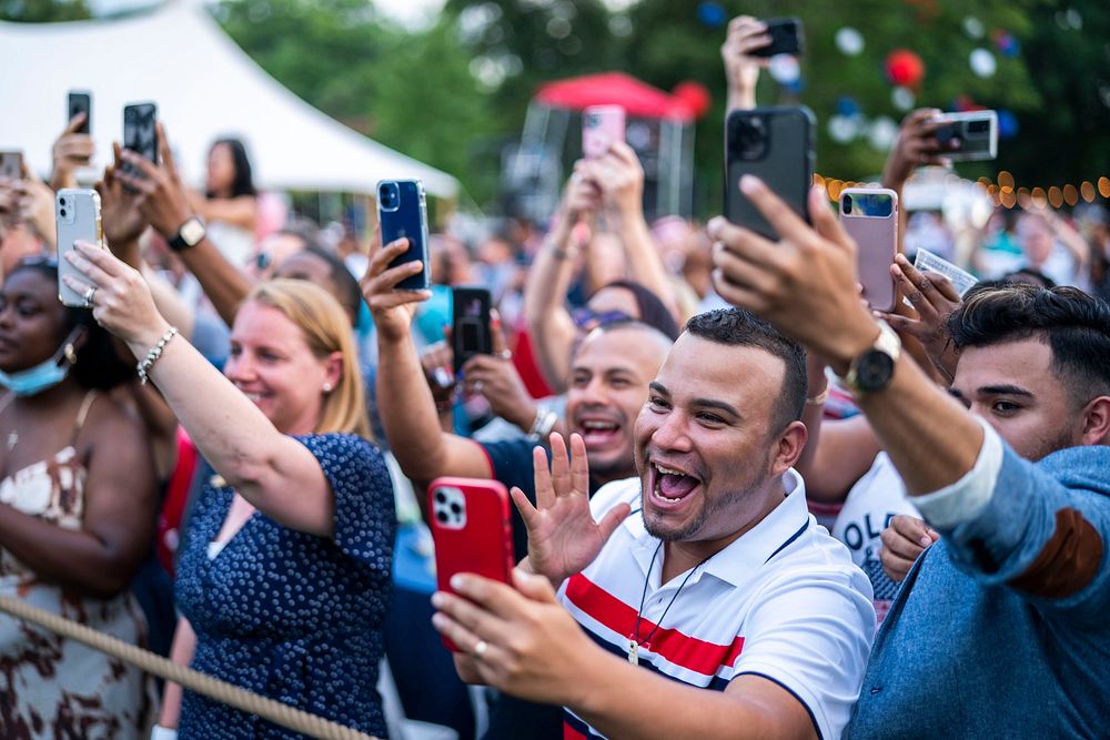 Frontline workers and military families cheer for President Joe Biden during the Fourth of July celebration, Sunday, July 4…