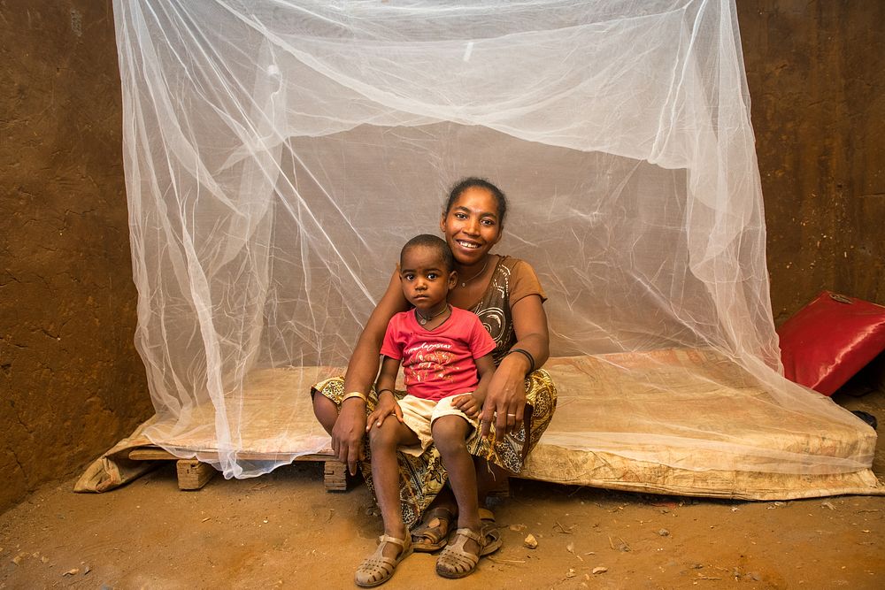 Mom and baby and their mosquito bed net