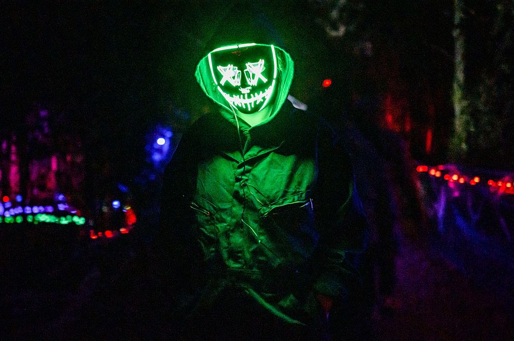 Man with neon mask