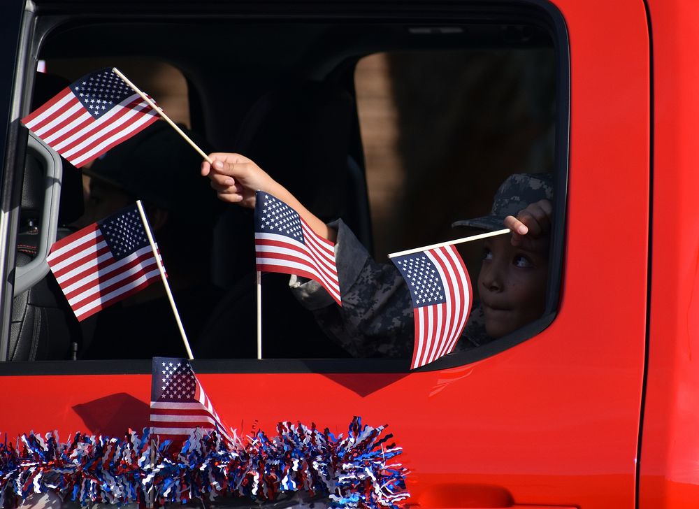 People waving American flags.