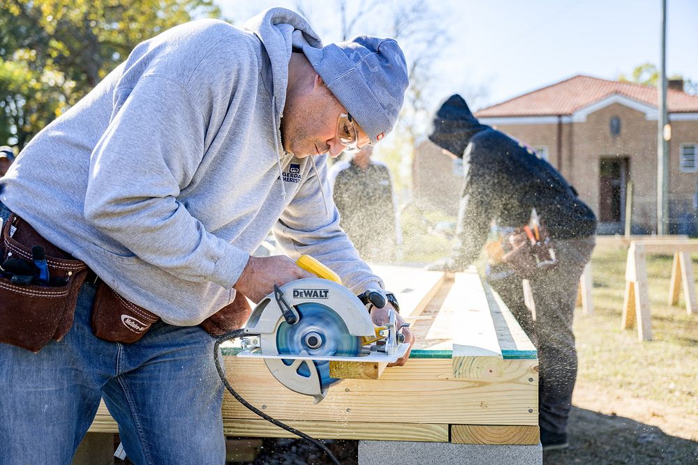 Students learn about subfloring and framing , Greenville, 2023. Original public domain image from Flickr