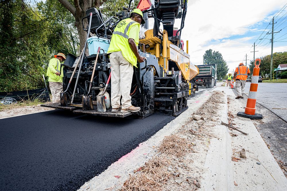 Construction on the greenway extension from Pitt Street to Memorial Drive nears completion as workers prepare for paving…