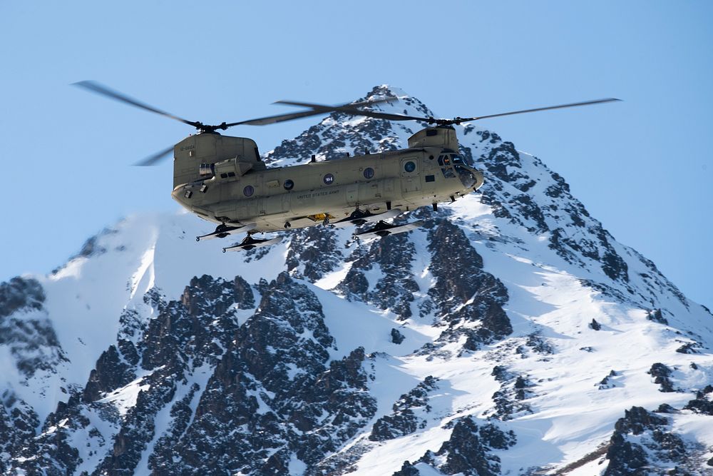 An Alaska Army National Guard CH-47 Chinook helicopter, operated by Army aircrew assigned to B Company, 2-211th General…