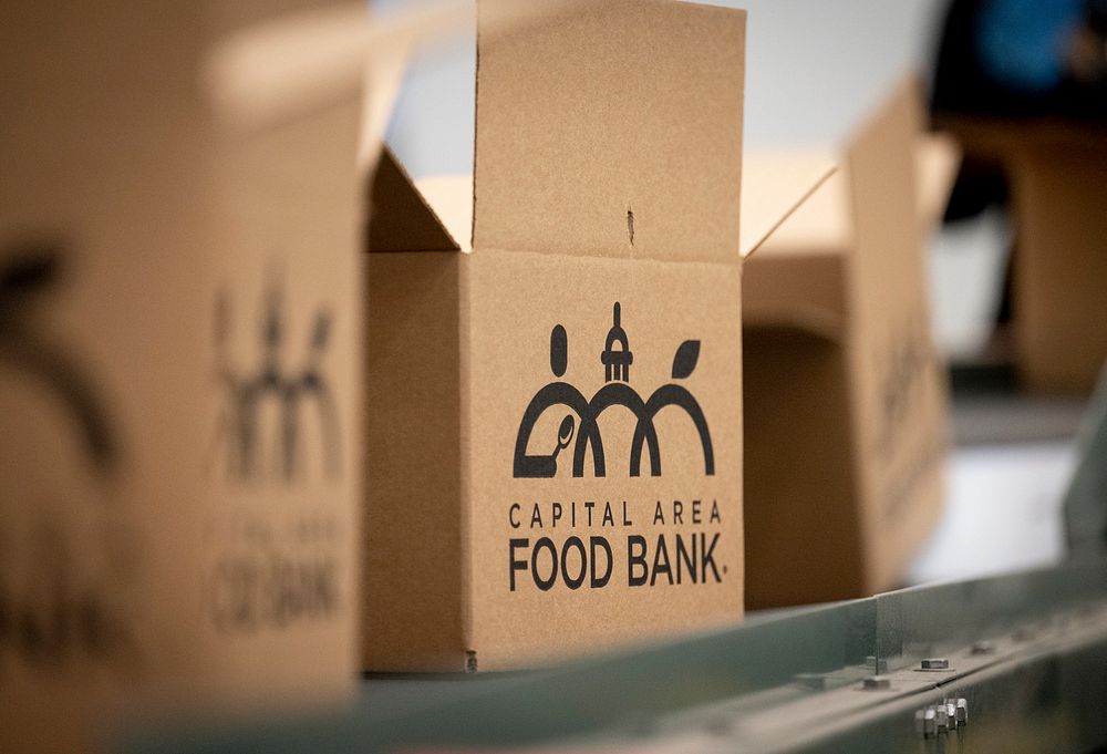 Sort and pack donated food at Capital Area Food Bank Washington, D.C. on April 21, 2022. (DHS Photo by Benjamin Applebaum).…