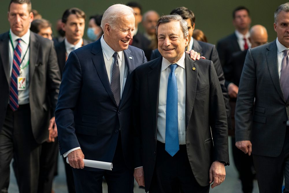 President Joe Biden walks with Italian Prime Minister Mario Draghi after a G7 leaders meeting, Thursday, March 24, 2022, at…