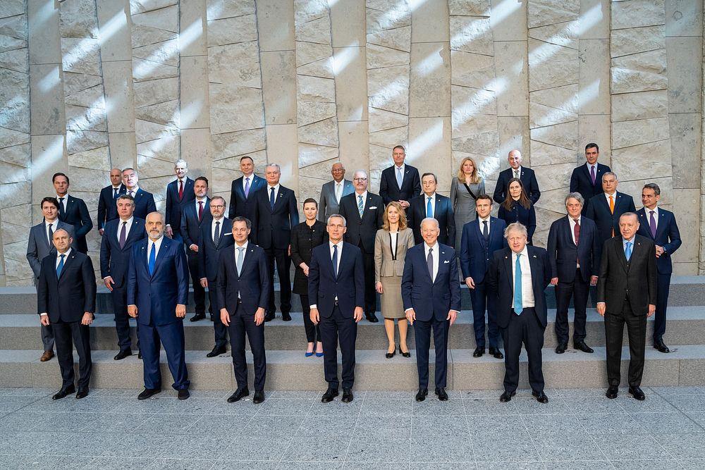President Joe Biden poses for a group photo with world leaders, Thursday, March 24, 2022, at NATO Headquarters in Brussels…