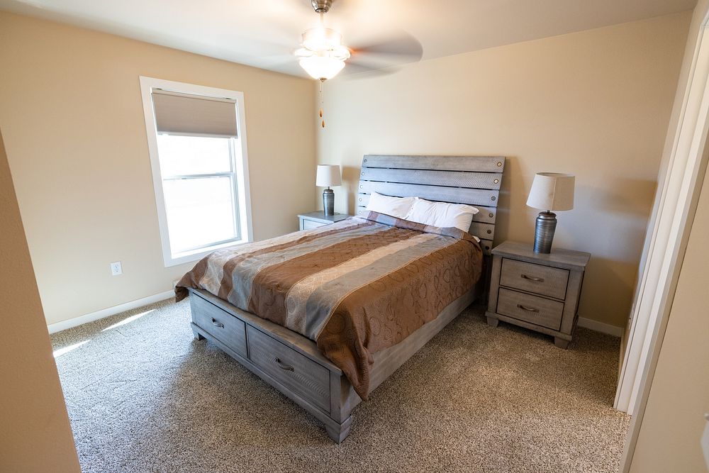 Housing improvement project goal 1: two-bedroom unit, bedroomNPS / Jacob W. Frank