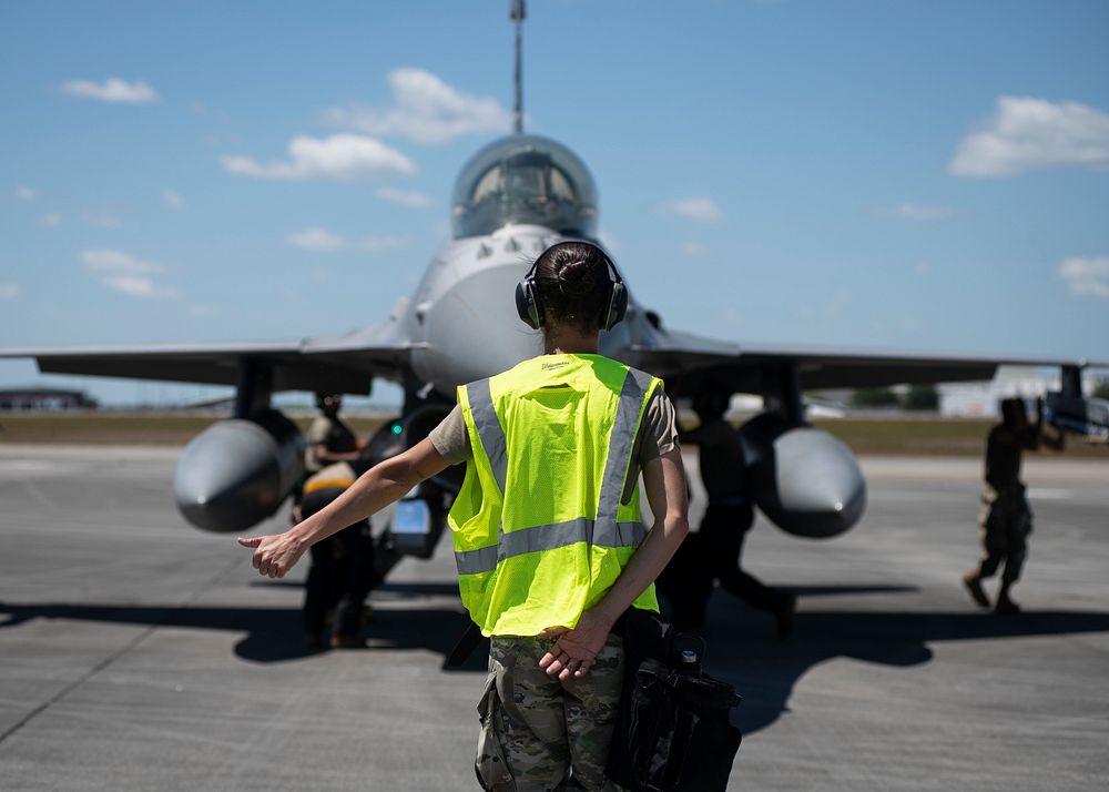 A U.S. Air Force crew chief assigned to the 157th Fighter Squadron, South Carolina Air National Guard, performs a pre-flight…