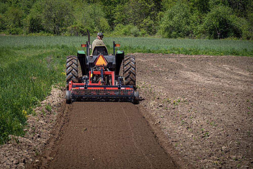 Beginning Farmers Max Morningstar, seen tilling one of his fields for planting, and Maria Zordan run MX Morningstar Farm, a…