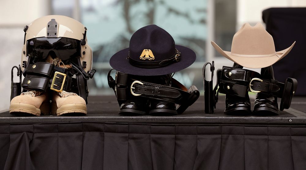 Service helmets, hats and boots rest atop a table as U.S. Customs and Border Protection hosts the annual Valor Memorial and…