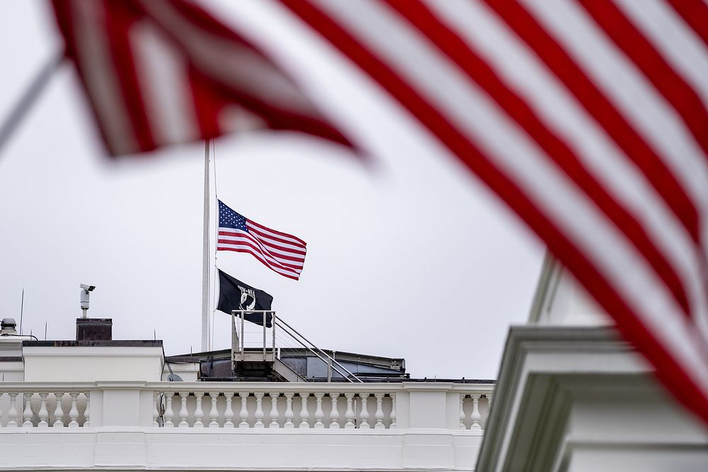 Flags fly at half-staff over the White House to mark the milestone of one million American lives lost to COVID-19, Thursday…