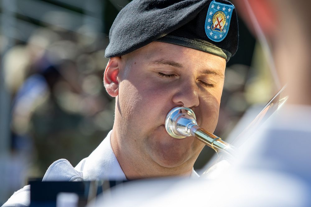 Brass band musician. Original public domain image from Flickr