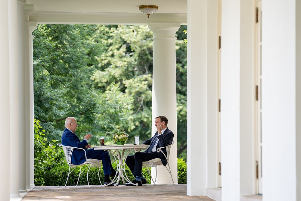 President Joe Biden meets with Sen. Chris Murphy (D-Conn.), Tuesday, June 7, 2022 on the Colonnade patio outside the Oval…