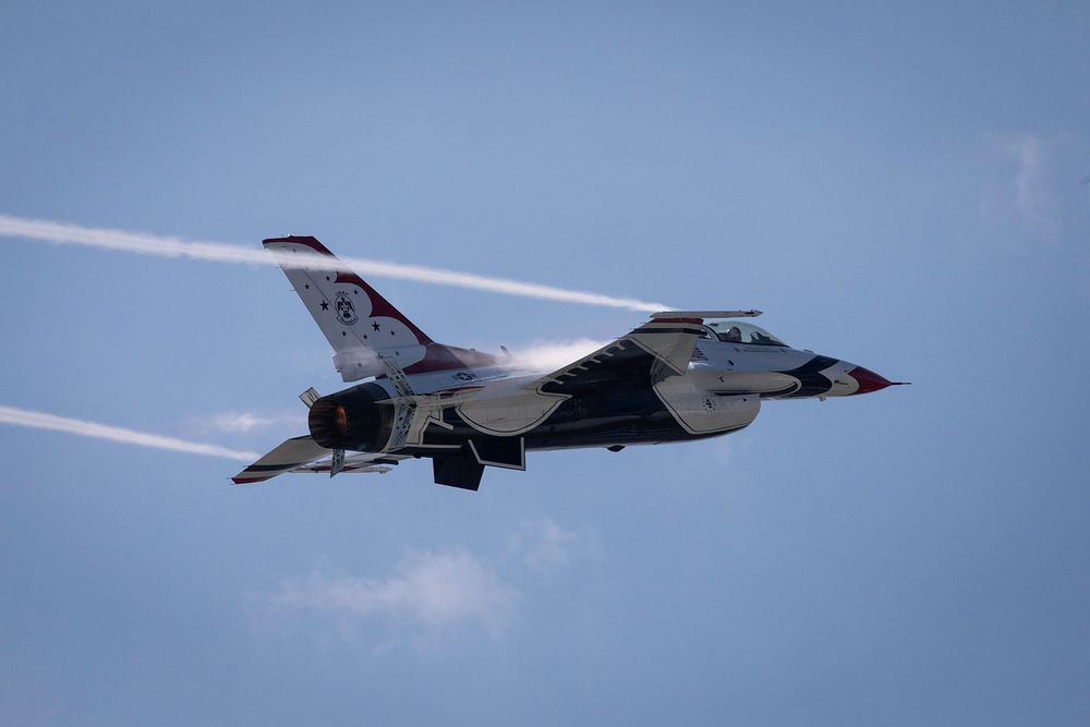 A U.S. Air Force F-16 Fighting Falcon with the Thunderbirds returns to formation during the 2022 Atlantic City Airshow at…