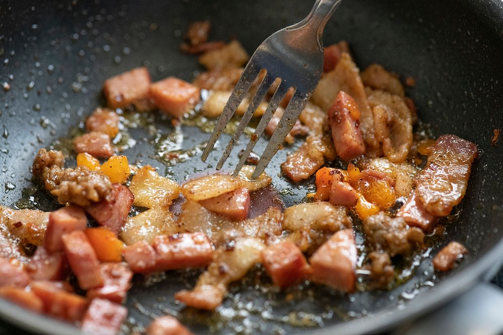 Frying bacons and onions.